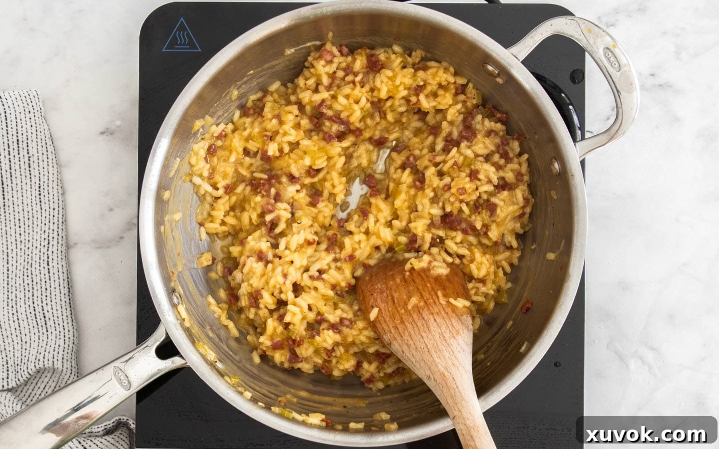 Risotto after Manchego cheese has been stirred in.