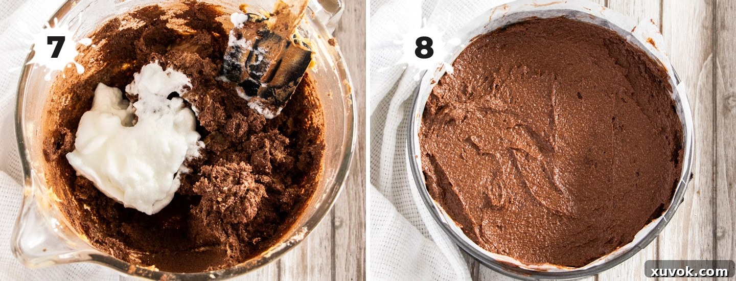 Adding whipped egg whites to the chocolate batter.