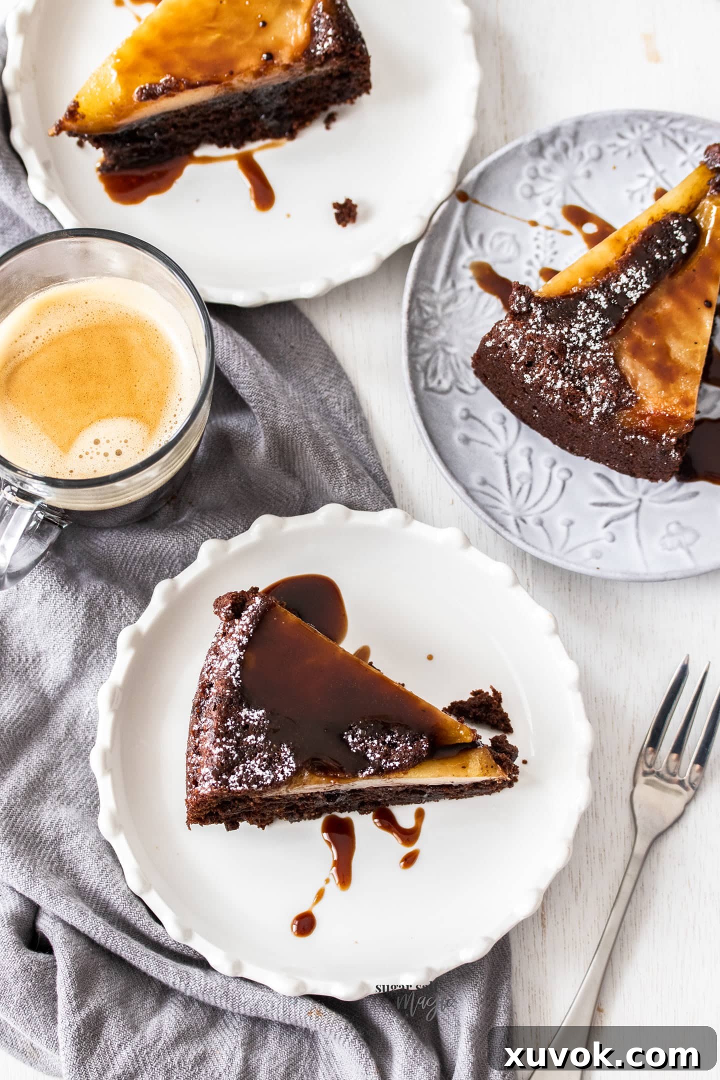 Slices of cake on small dessert plates, ready to be served.