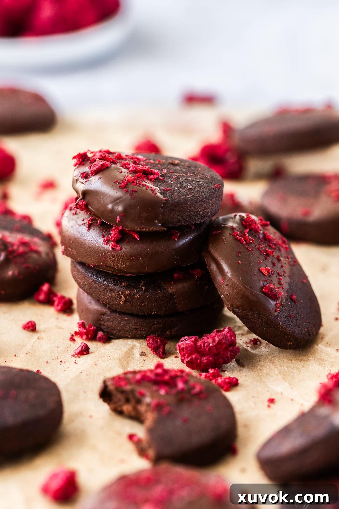 An elegant stack of four perfectly baked chocolate shortbreads, showcasing their rich color and inviting texture.