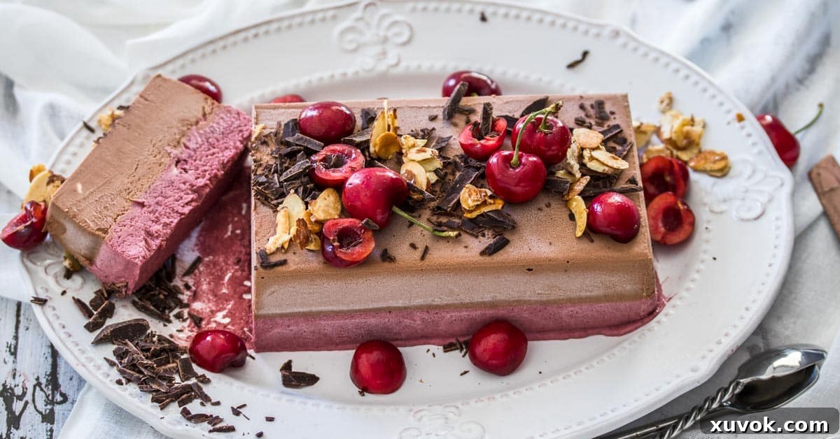 This Frozen Cherry Chocolate Parfait recipe is a layered no churn ice cream parfait. Layers of cherry ice cream and chocolate ice cream, combine into a smooth and creamy, easy dessert.