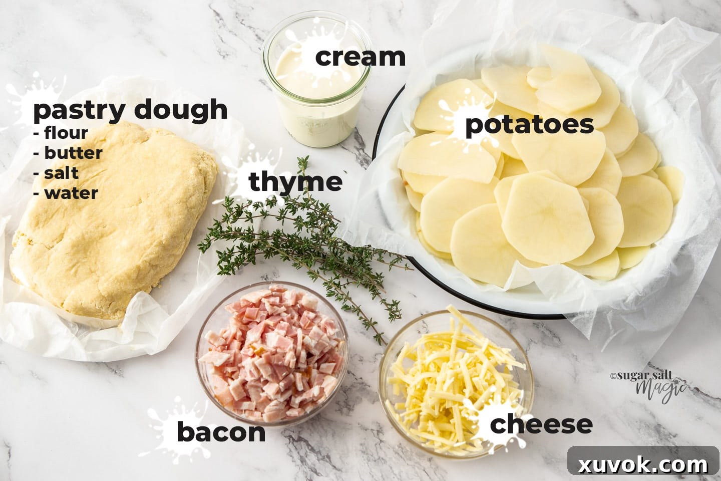 Ingredeints for bacon potato tart on a marble background.
