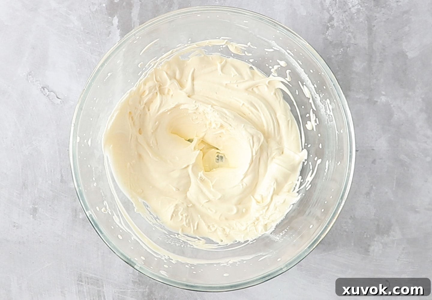 The whipped cream in a bowl.