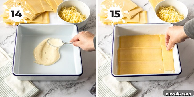 A white baking pan with a base layer of creamy béchamel sauce, ready for the first layer of lasagna sheets.