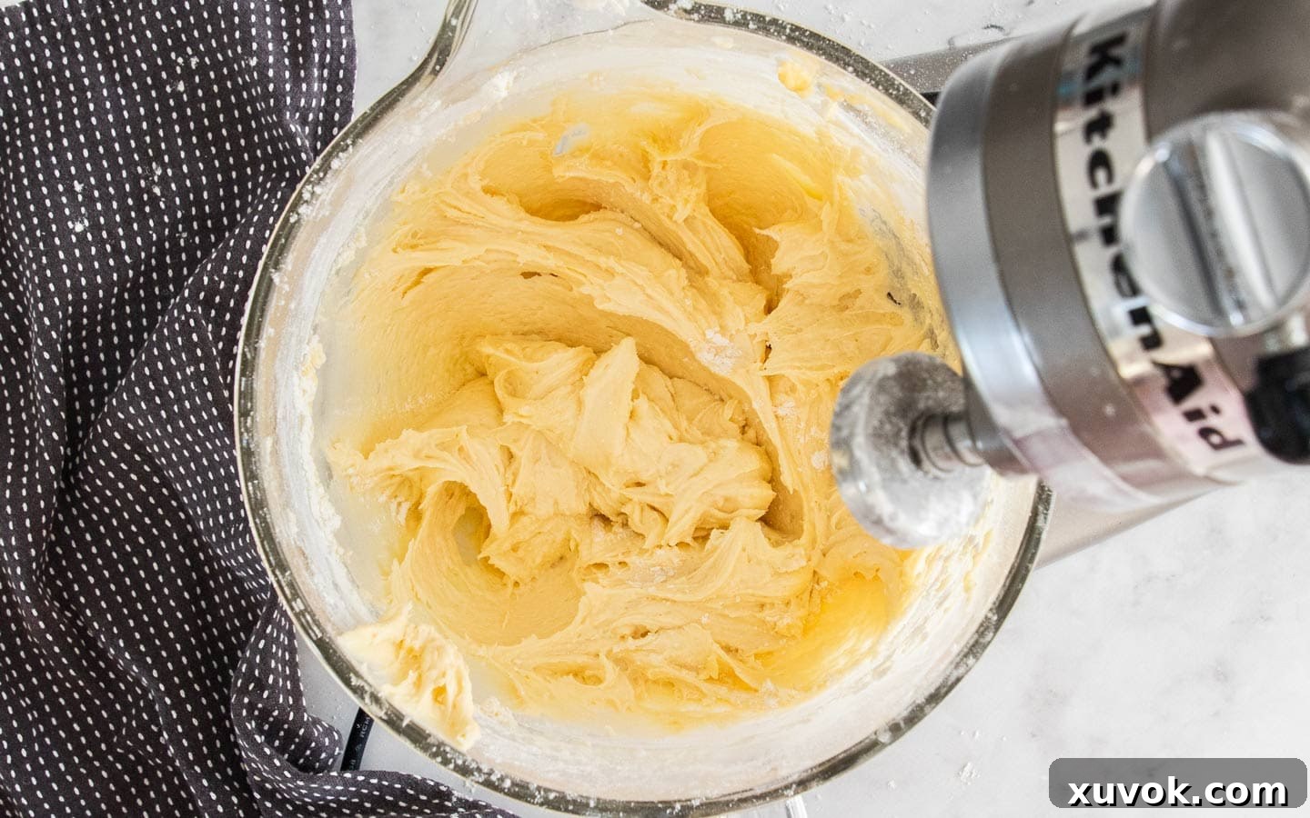 The fully mixed cake batter, smooth and ready for layering.