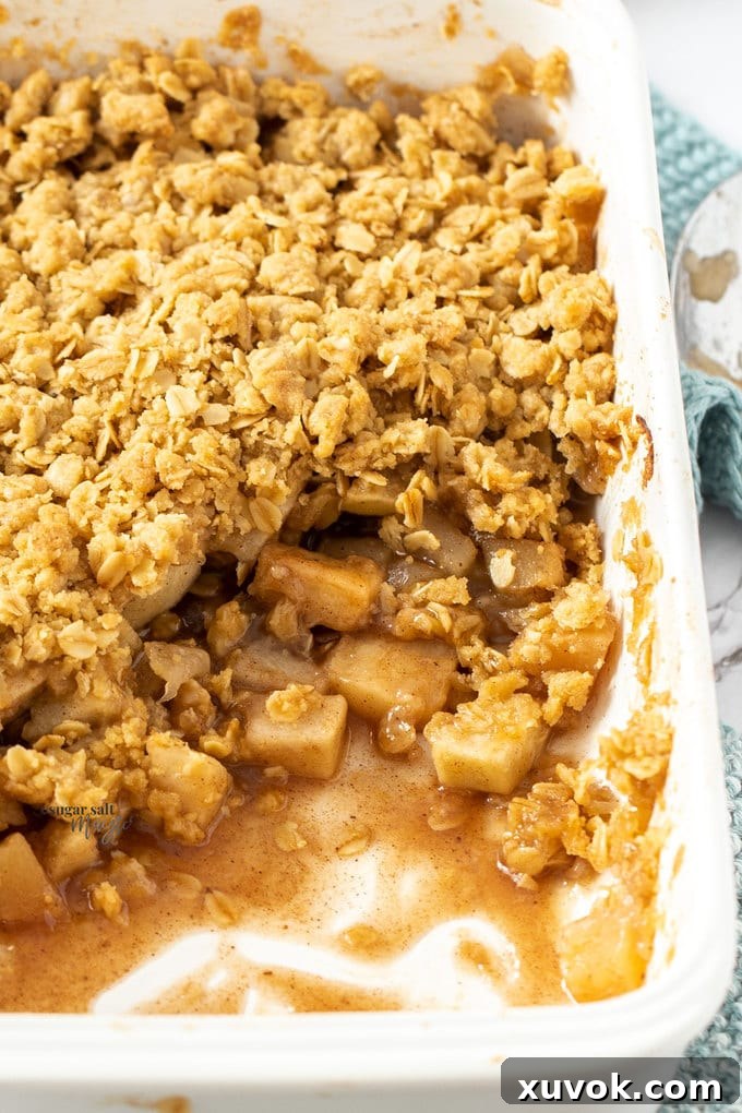 Closeup of apple crumble in a white rectangular dish