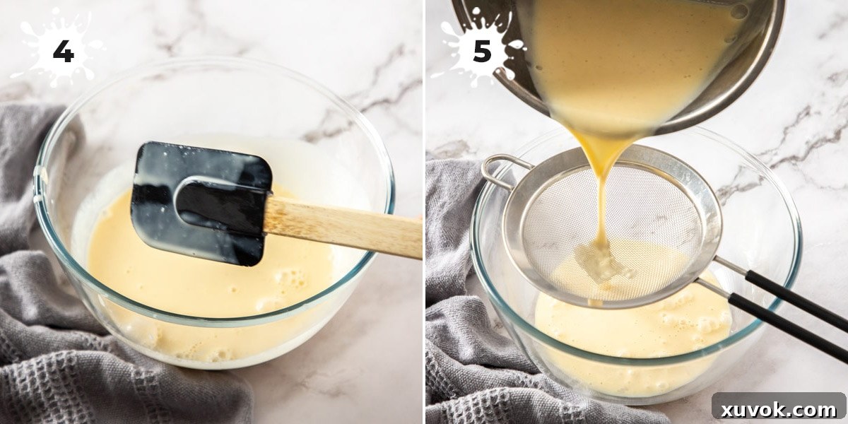 Pouring freshly cooked crème anglaise through a fine-mesh sieve into a clean bowl, ensuring a perfectly smooth and lump-free vanilla sauce.