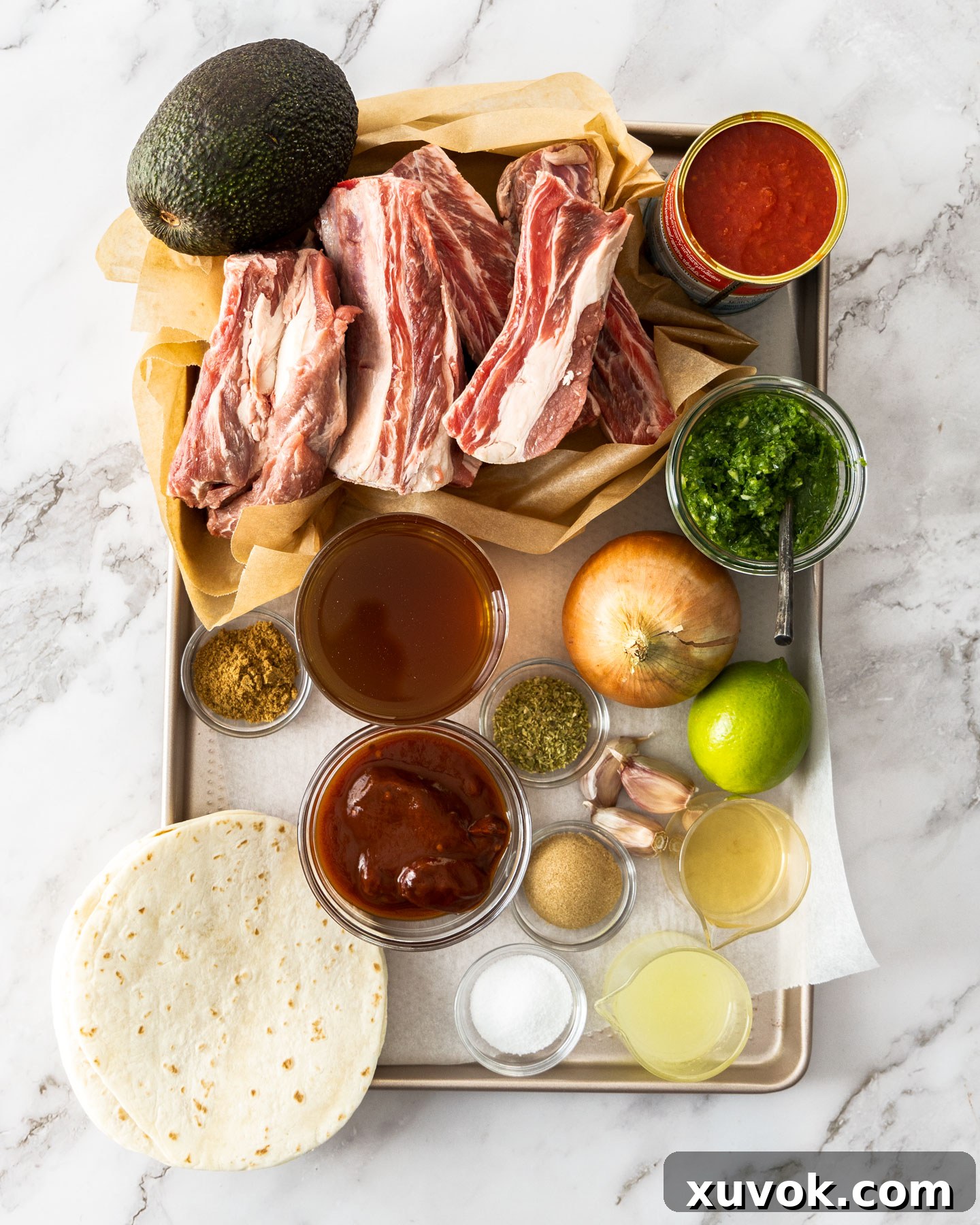 Ingredients for short rib tacos on a baking tray.