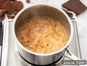 Bubbling caramel in a saucepan.