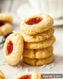 A stack of 5 coconut jam drops, perfectly golden and inviting.