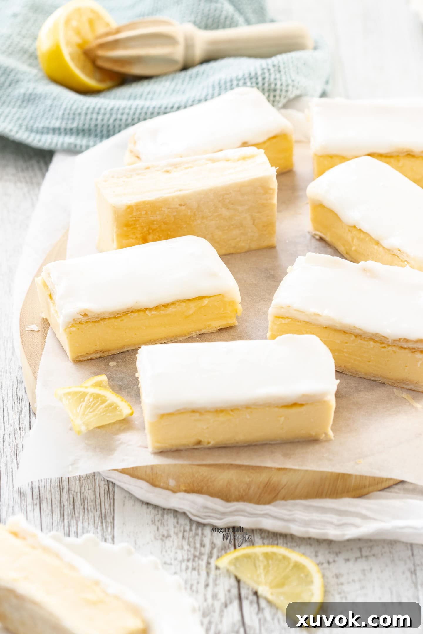 7 pieces of custard slice on a platter, showcasing the creamy filling and flaky pastry.