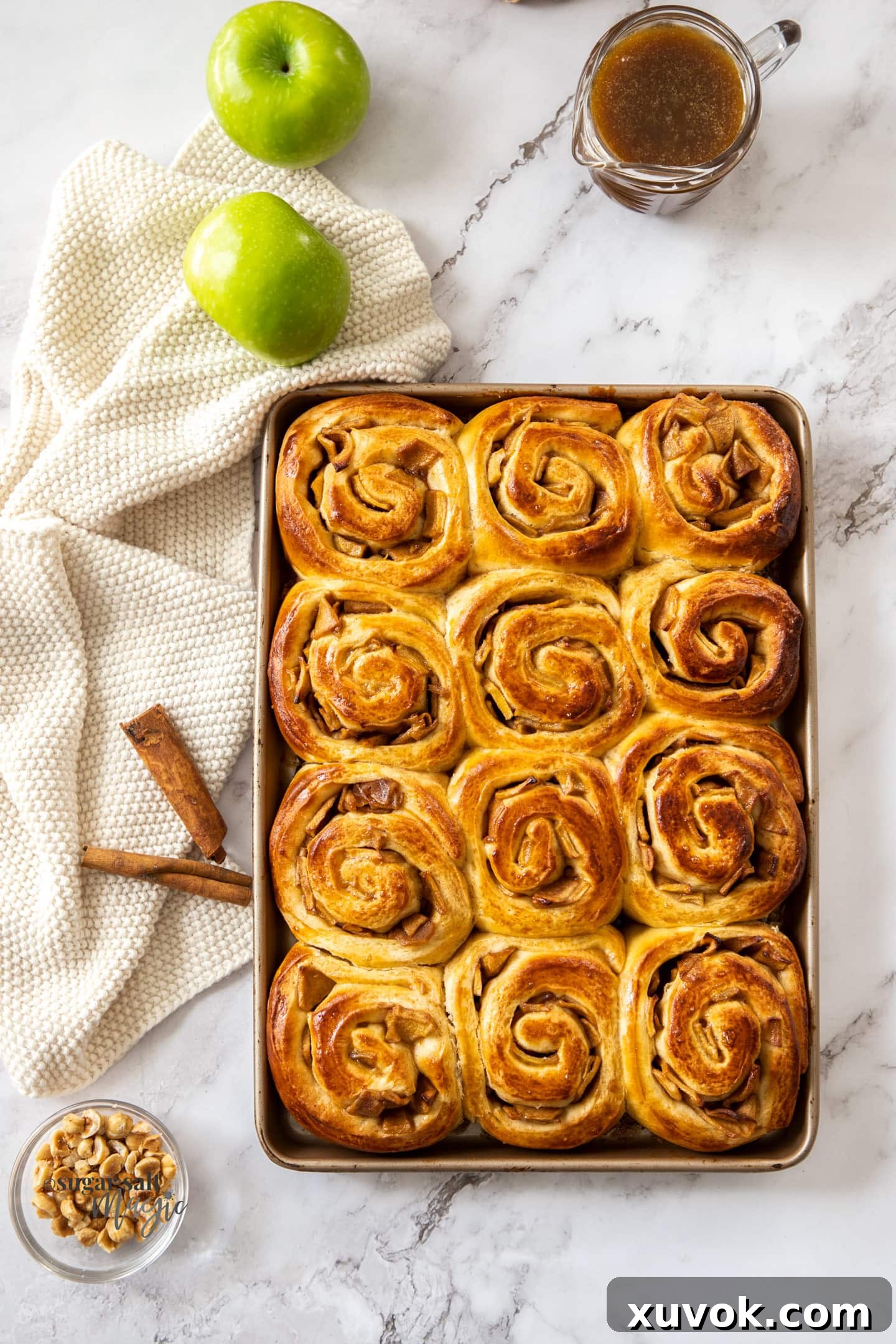 Birdseye view of a tray filled with cinnamon rolls.