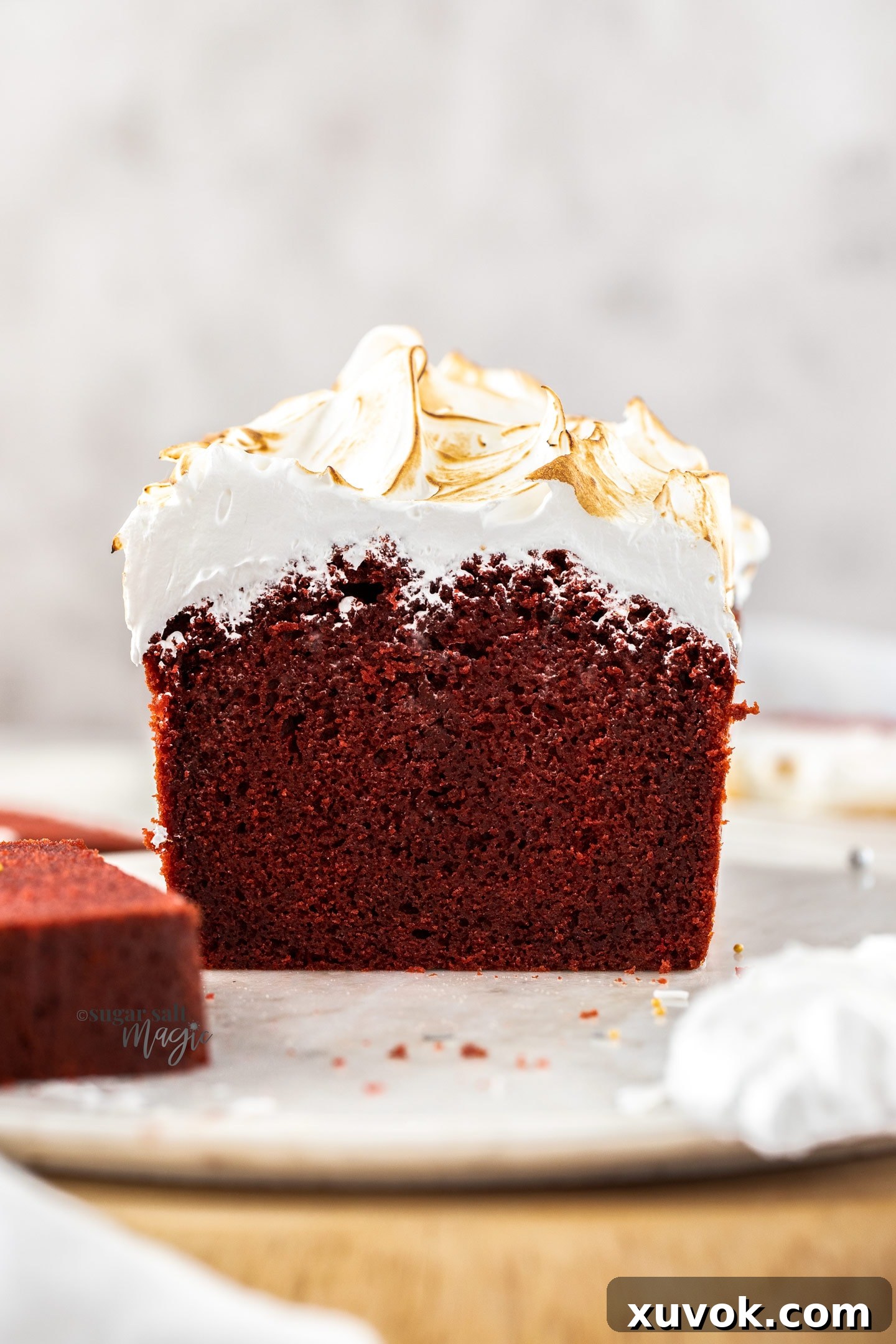 A close-up view of the perfectly moist, rich red crumb of the Red Velvet Pound Cake, highlighting its tender texture.