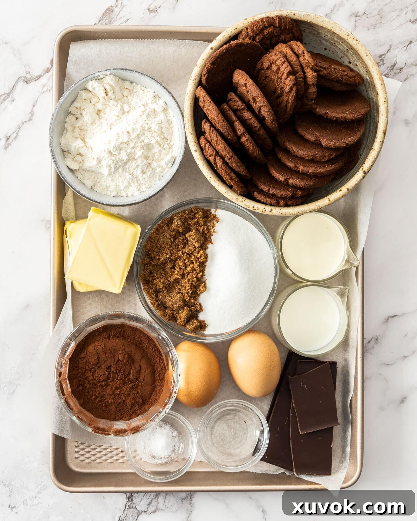 Ingredients for brownie tart laid out on a baking tray, ready for preparation.