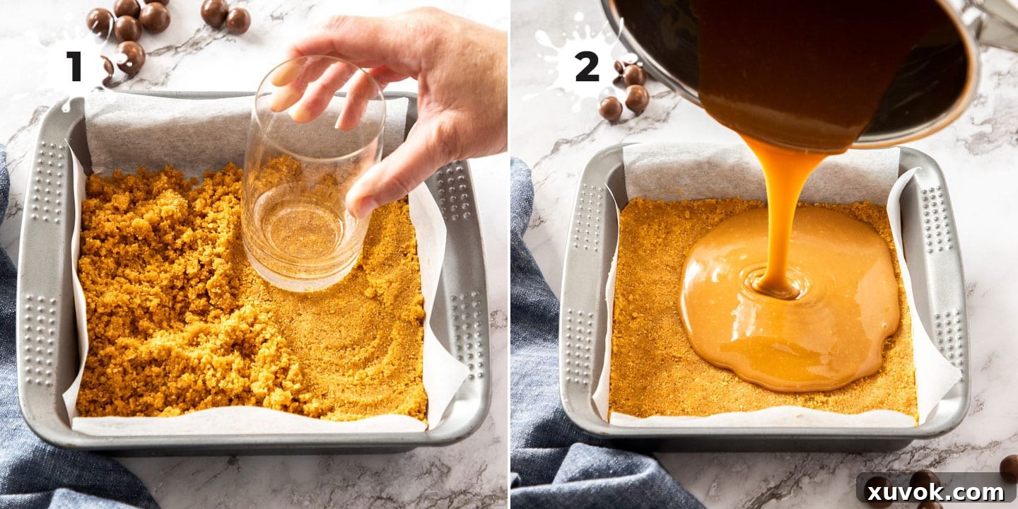 Crumbled biscuits mixed with melted butter being pressed into a square baking tin for the base of the slice.
