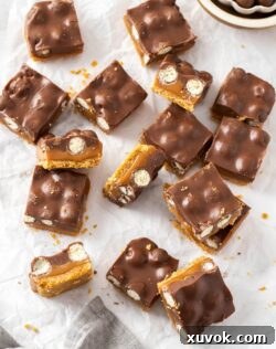 A batch of caramel filled chocolate bars, neatly arranged.
