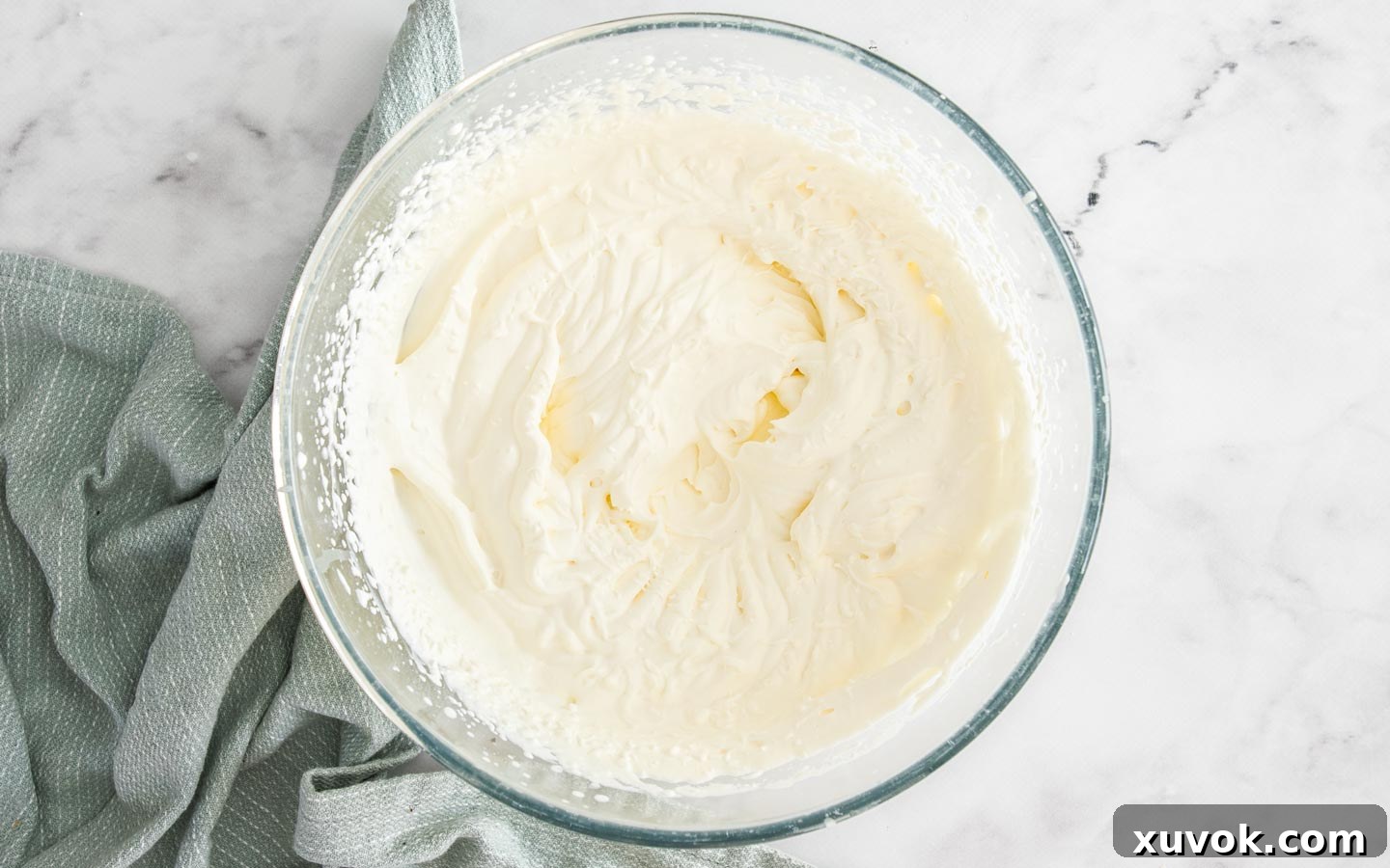 Whipped cream in a bowl.