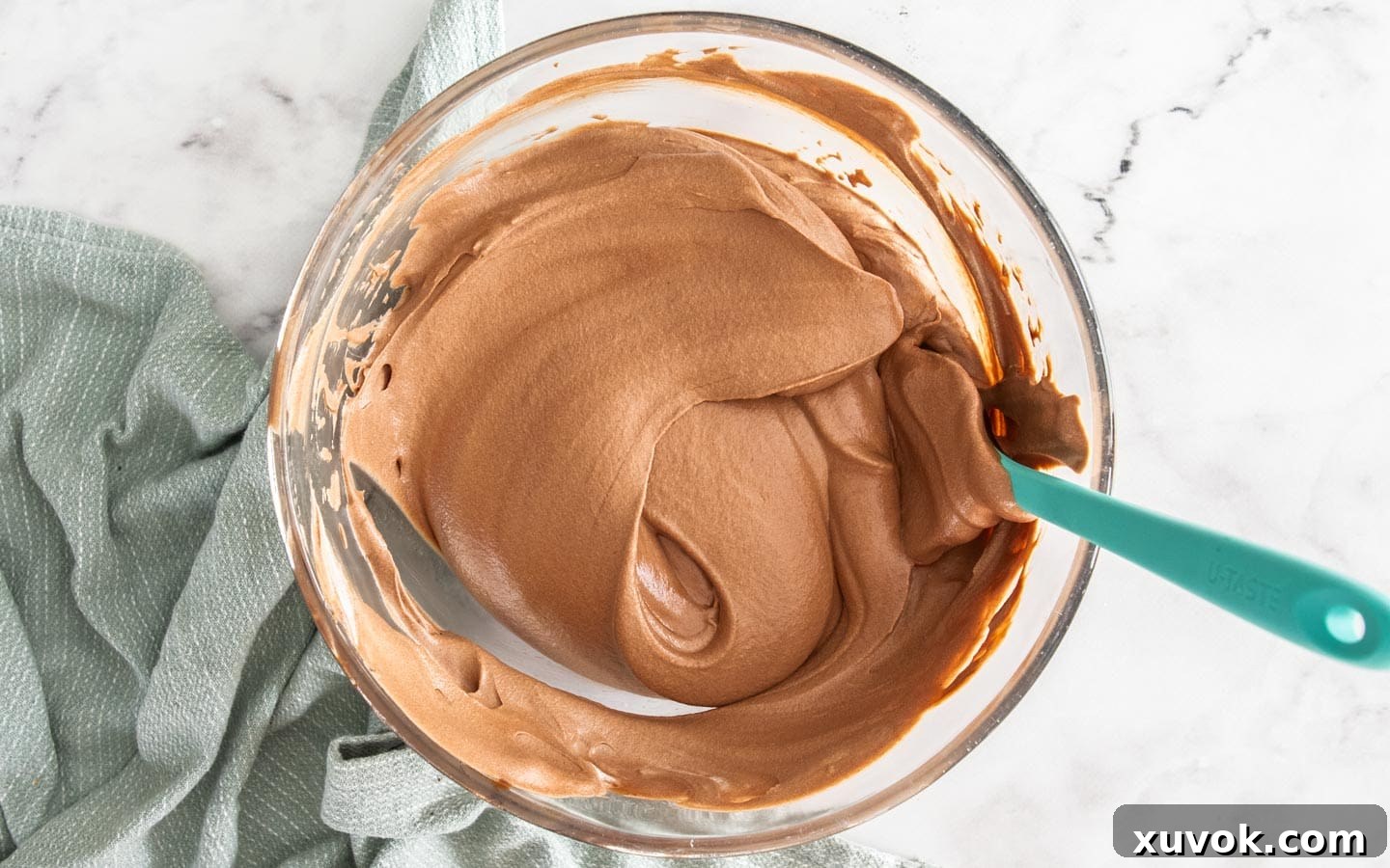 The chocolate mousse folded together in a bowl.