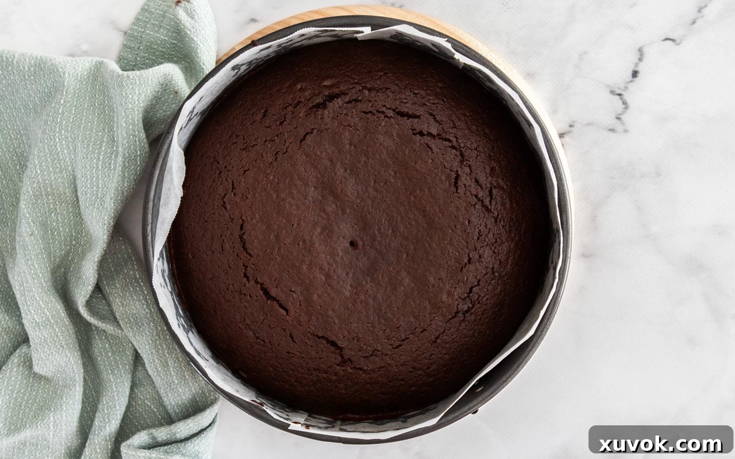 The baked cake in a cake pan.