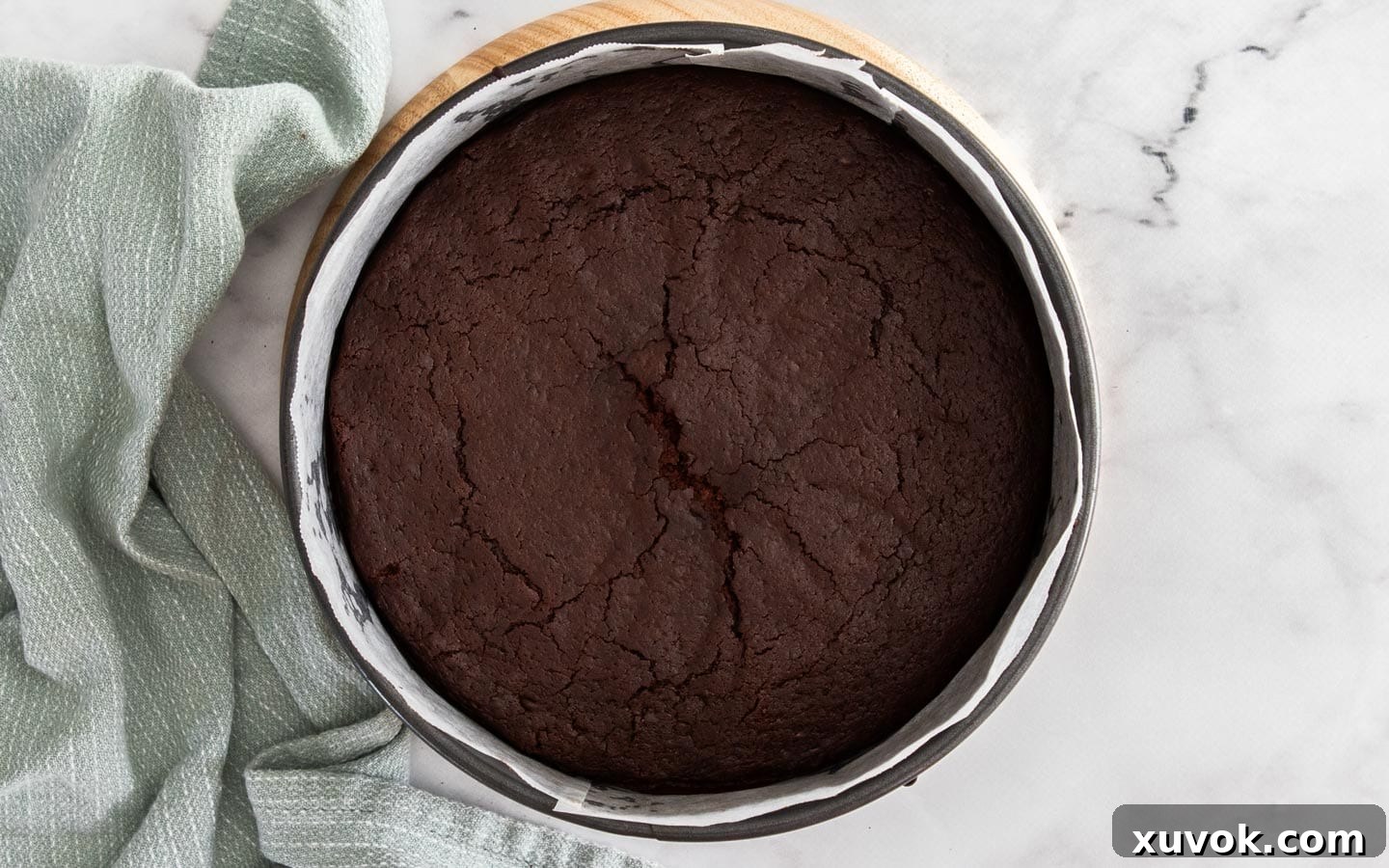 The baked cake with a flattened top.