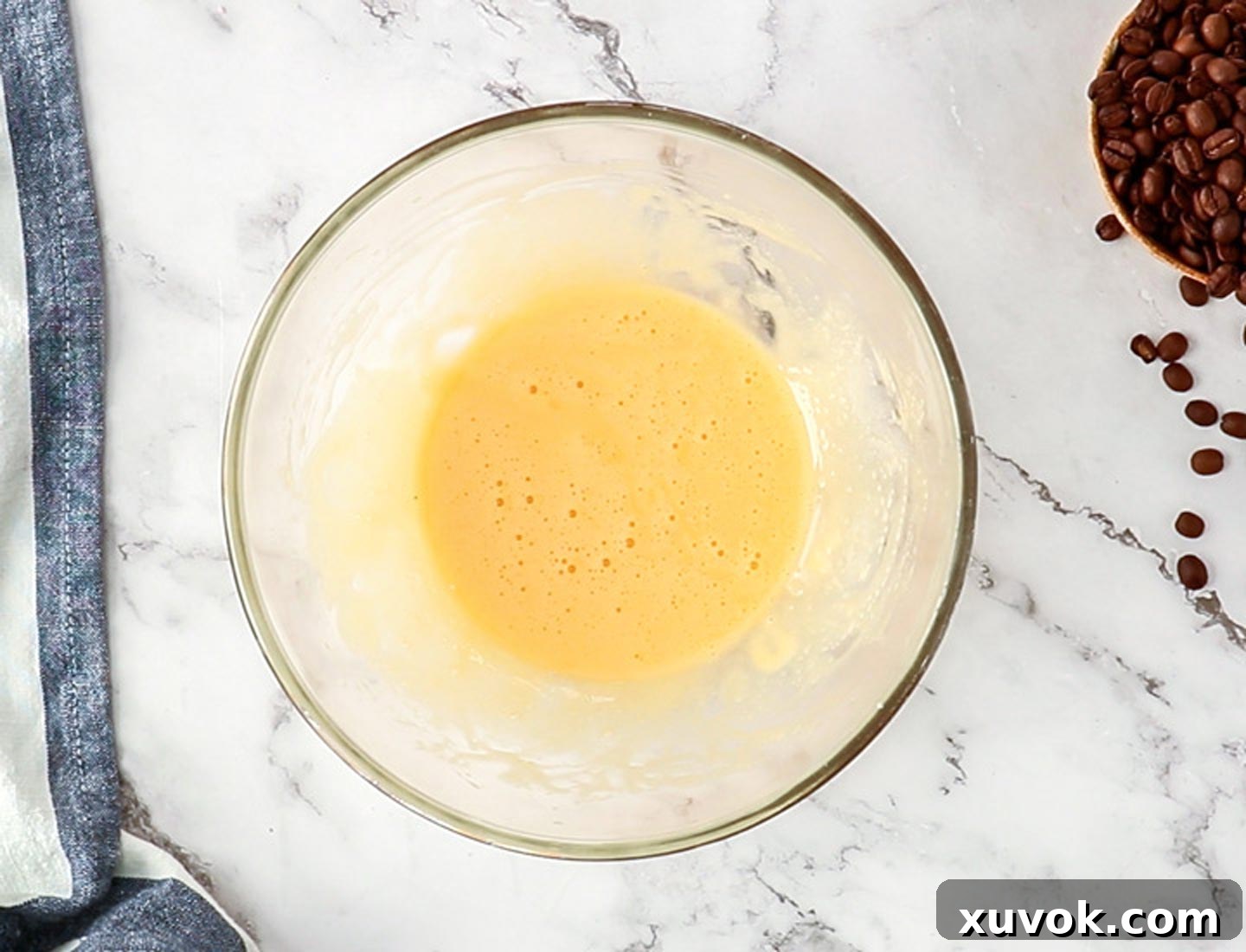 The beaten egg yolk mixture in a bowl.