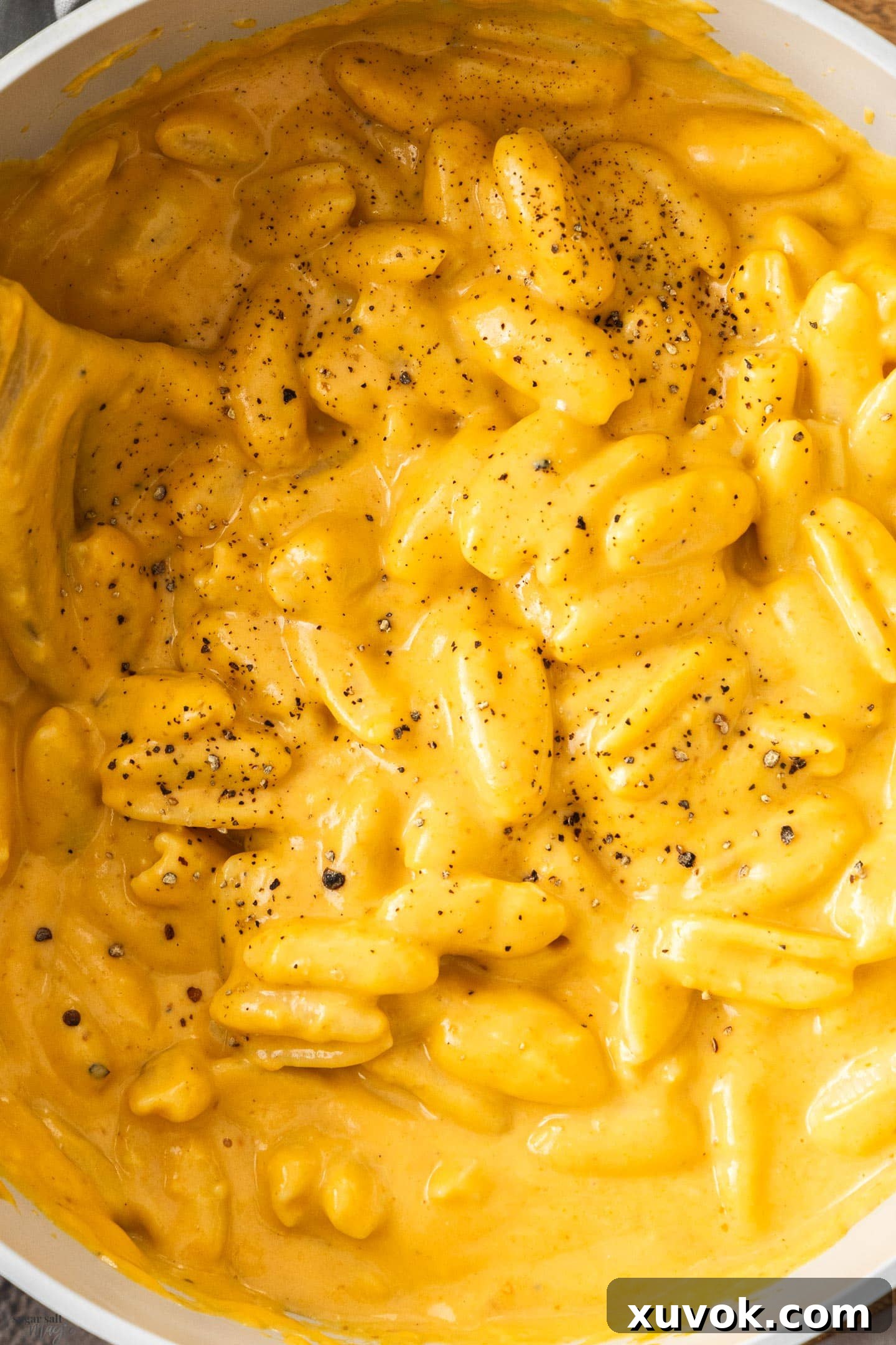 Top down extreme closeup of pumpkin mac n cheese.