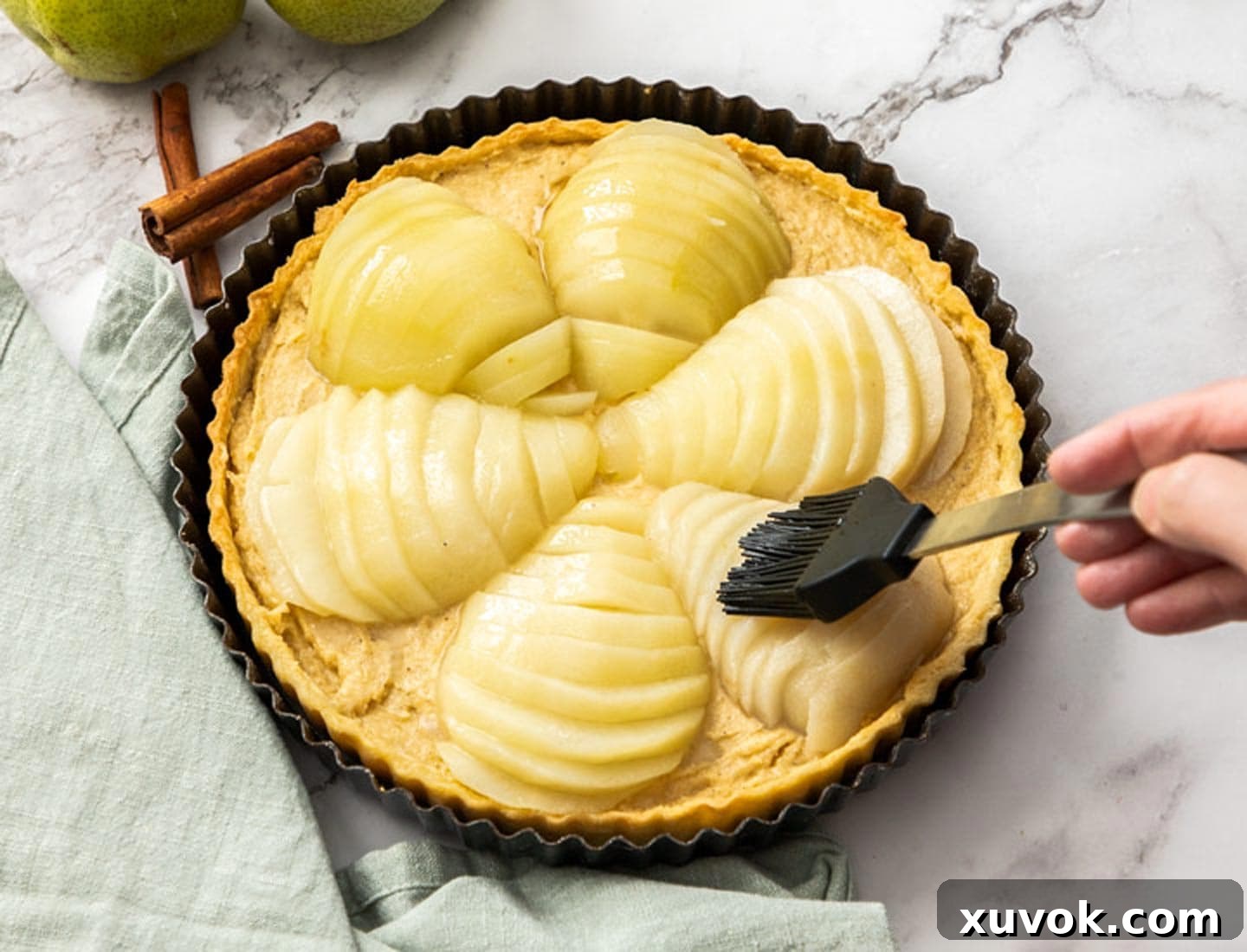 The pear almond tart before baking.