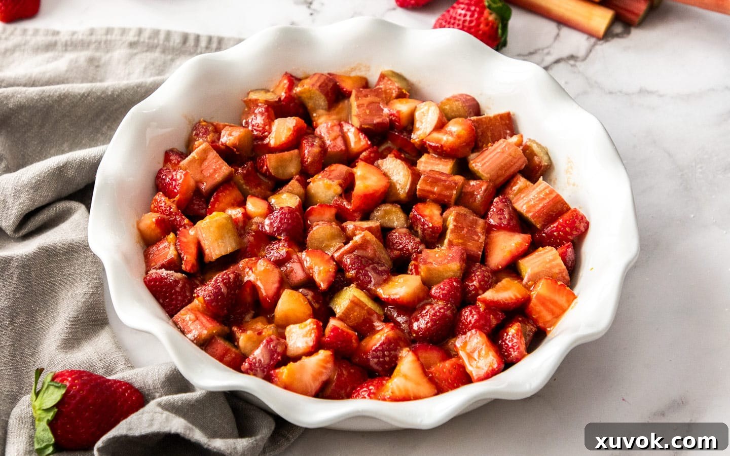 The cobbler filling in a pie dish.