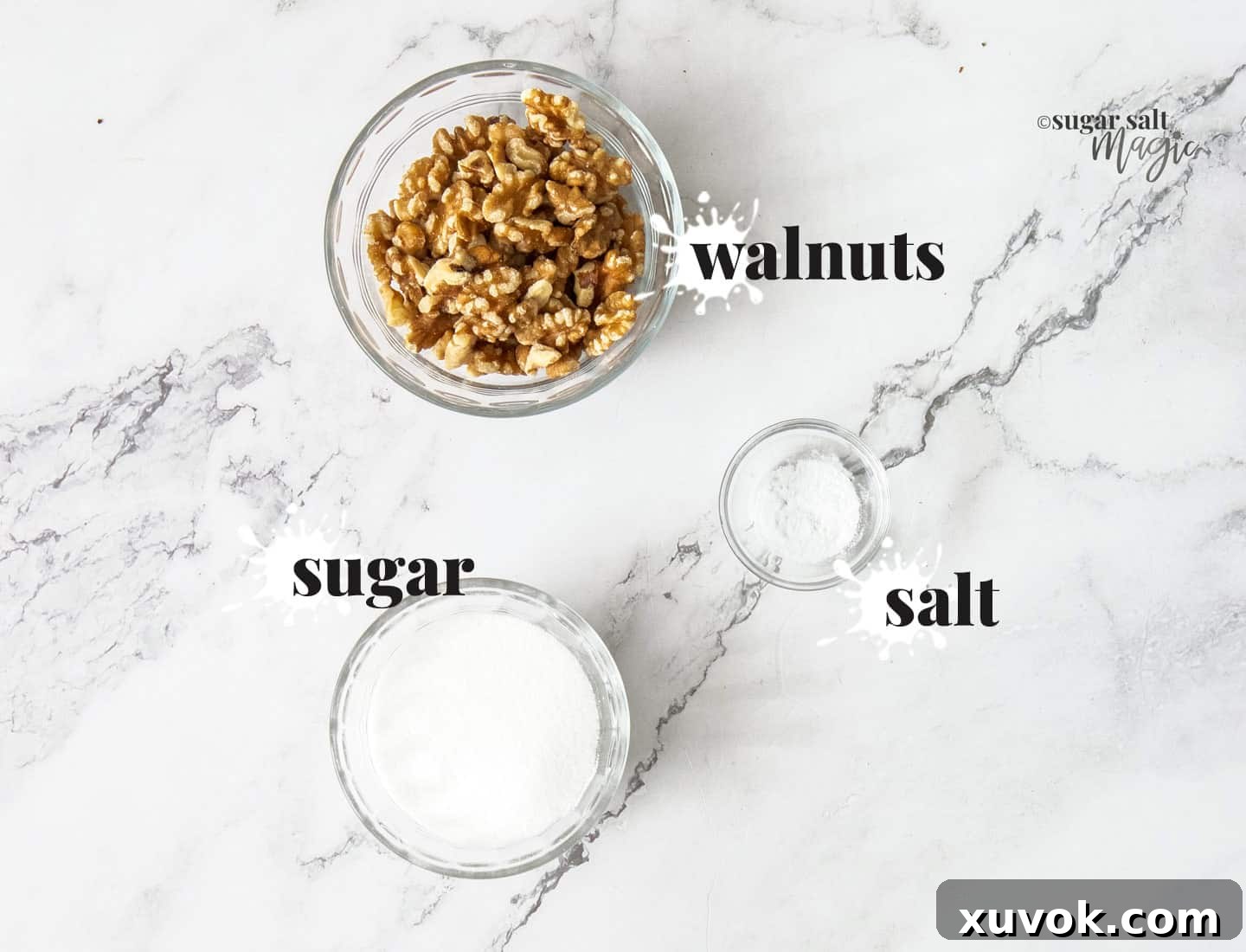 Ingredients for candied walnuts on a marble benchtop.