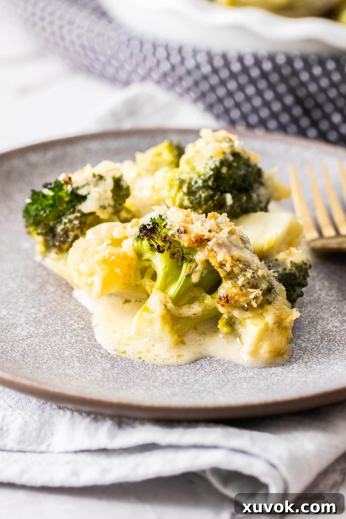 A serve of broccoli cheese bake on a plate.