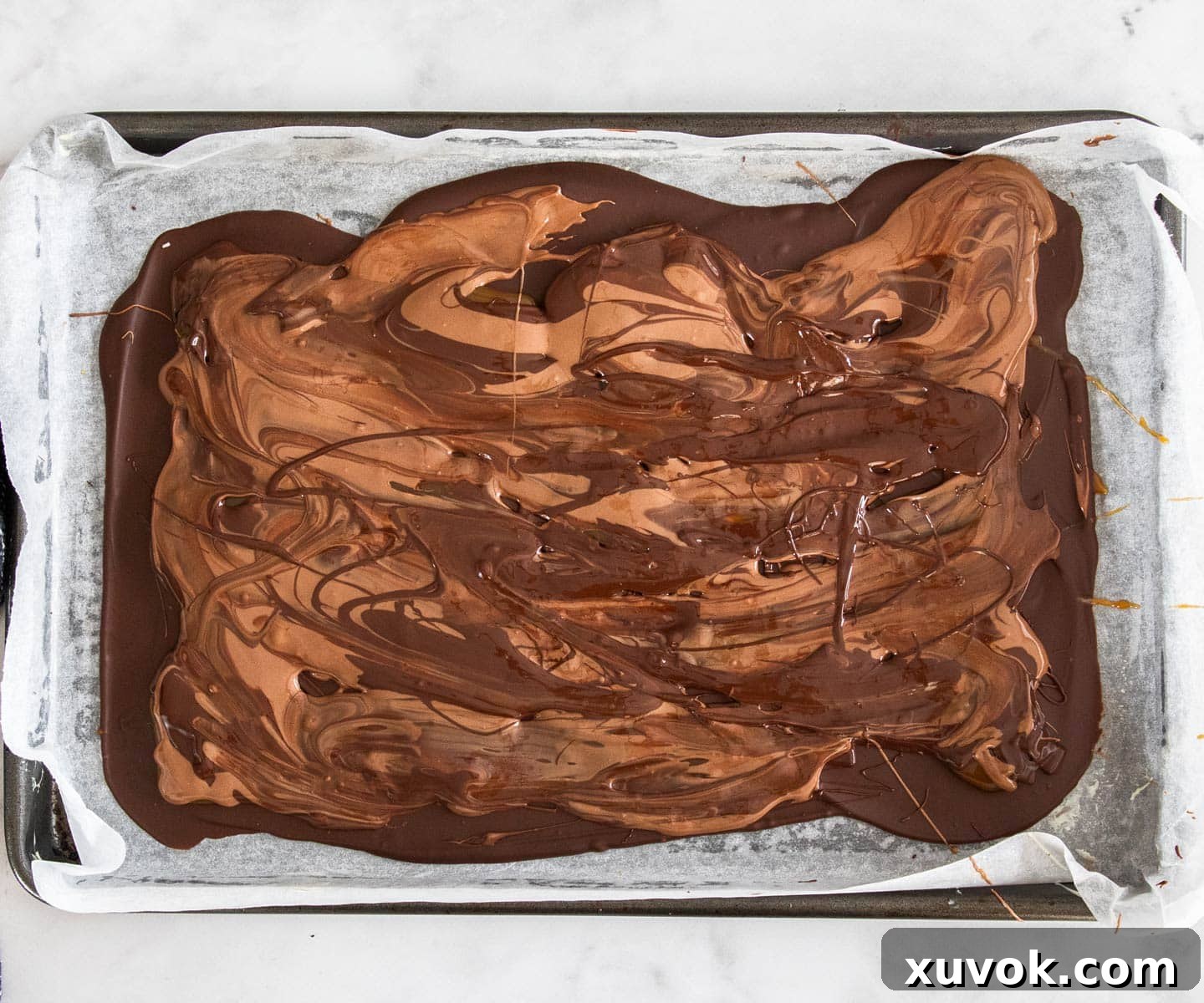 The pretzel caramel bark with its chocolate layers covering the caramel, before the final toppings.