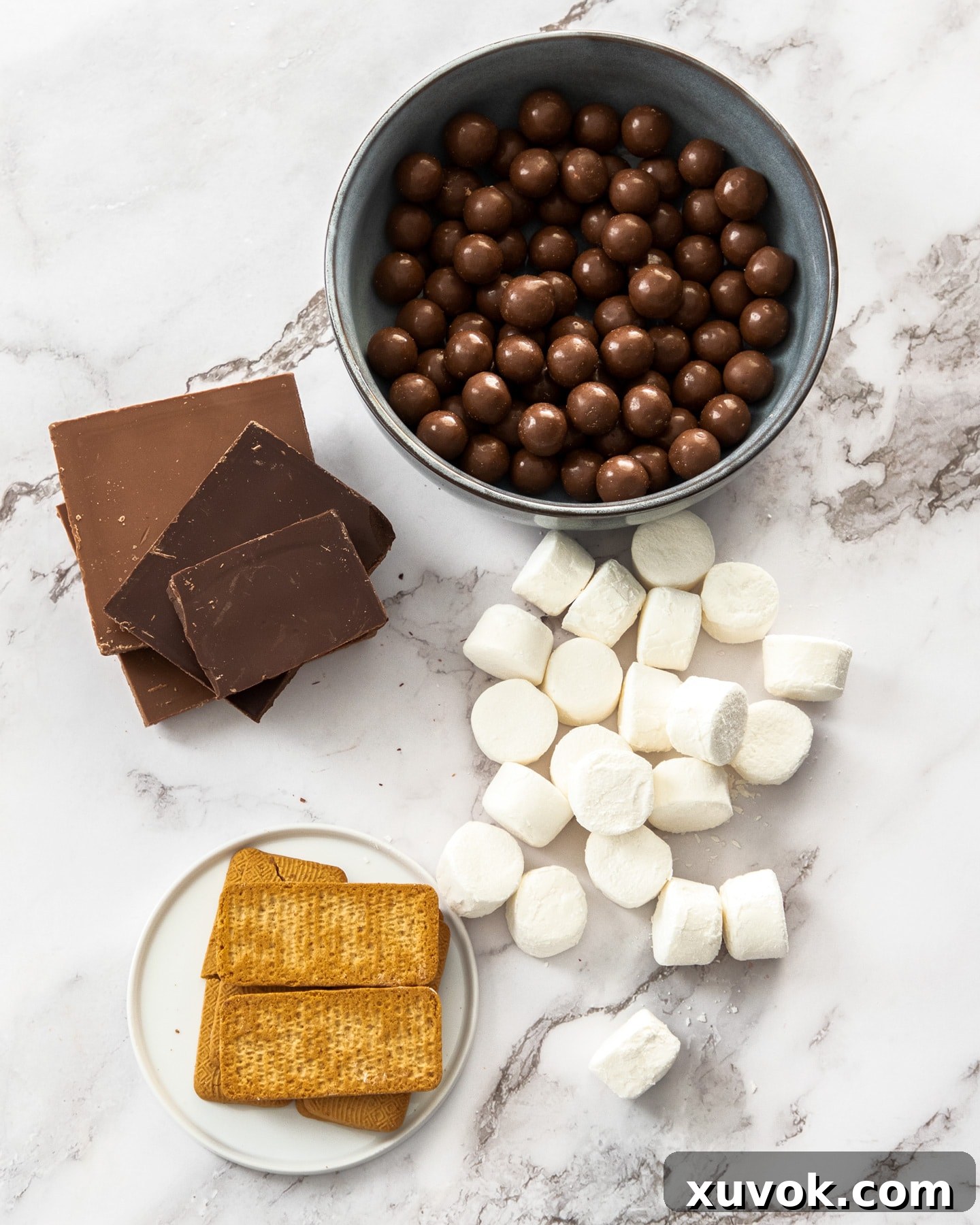 Ingredients for Malteser rocky road on a marble surface.