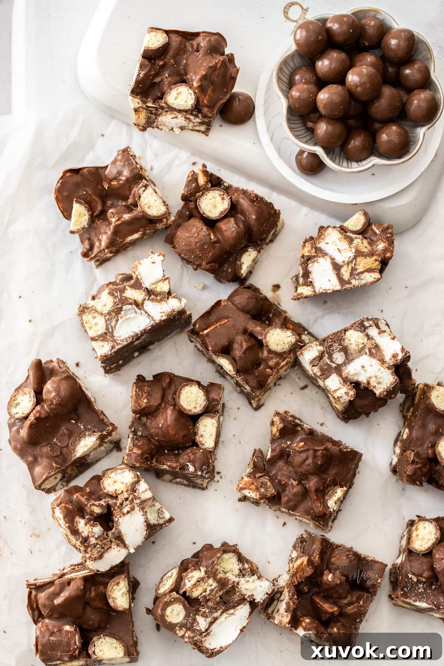 Top down view of cut up Malteser rocky road, showing the inside.