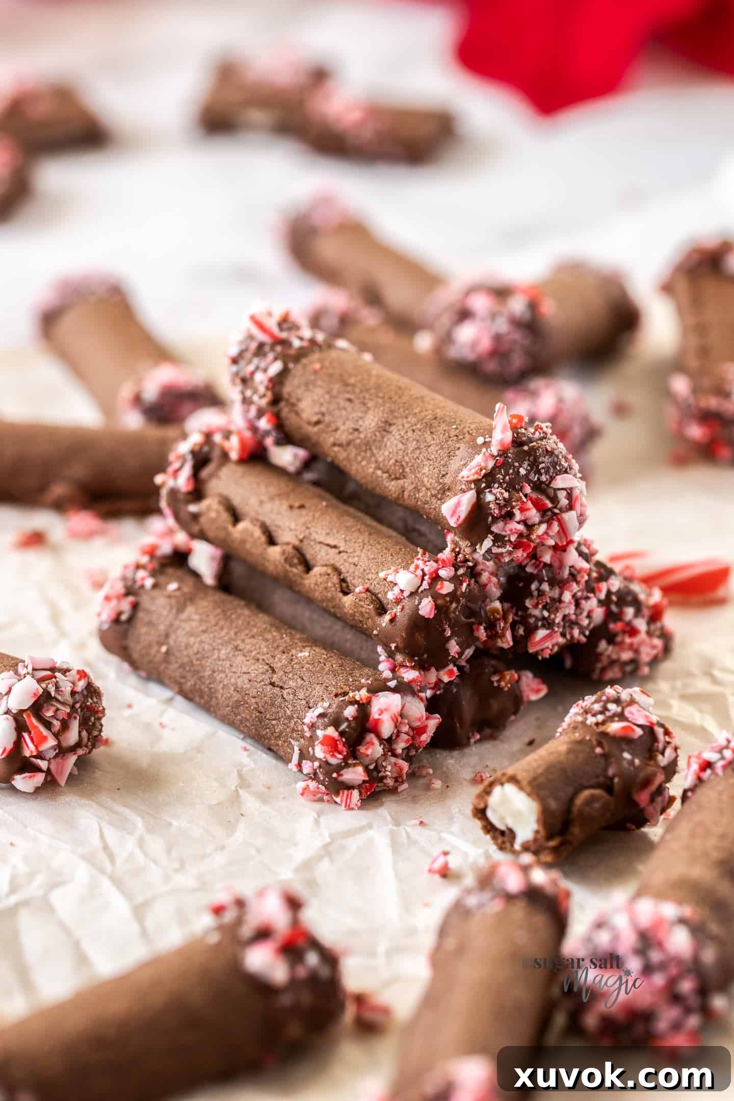 A stunning pyramid stack of peppermint chocolate roll cookies, perfectly showcasing their unique design and festive allure.