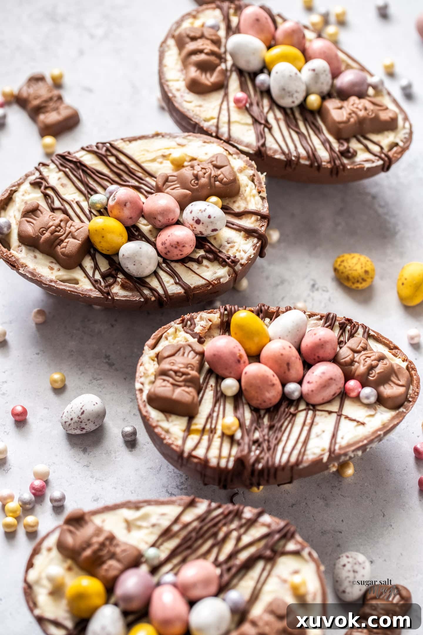 A beautiful close-up shot of Easter egg cheesecakes, highlighting the rich chocolate shell and vibrant toppings, ready to be enjoyed.