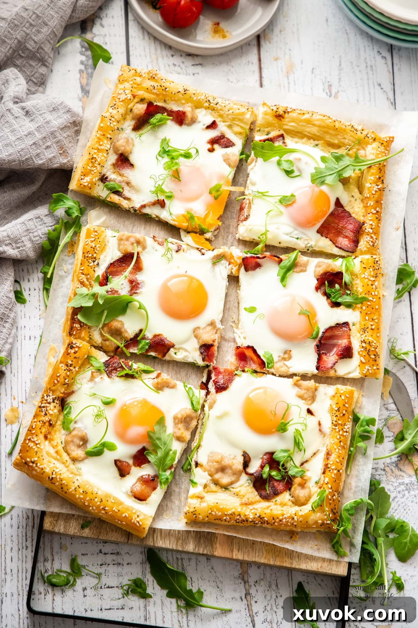 Top down view of a breakfast tart sliced into 6 pieces.