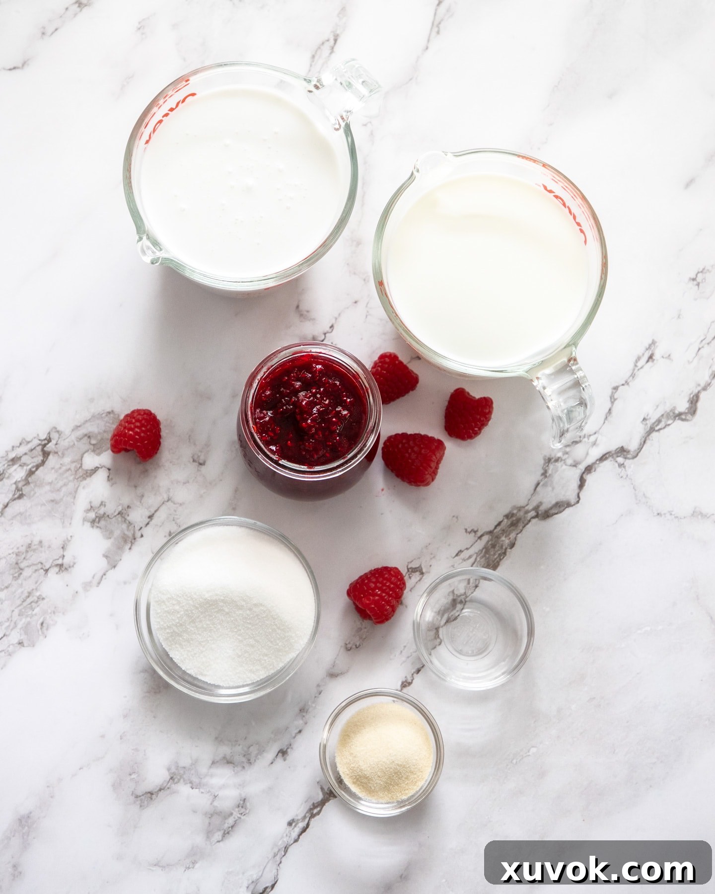 Ingredients for coconut panna cotta on a marble benchtop.