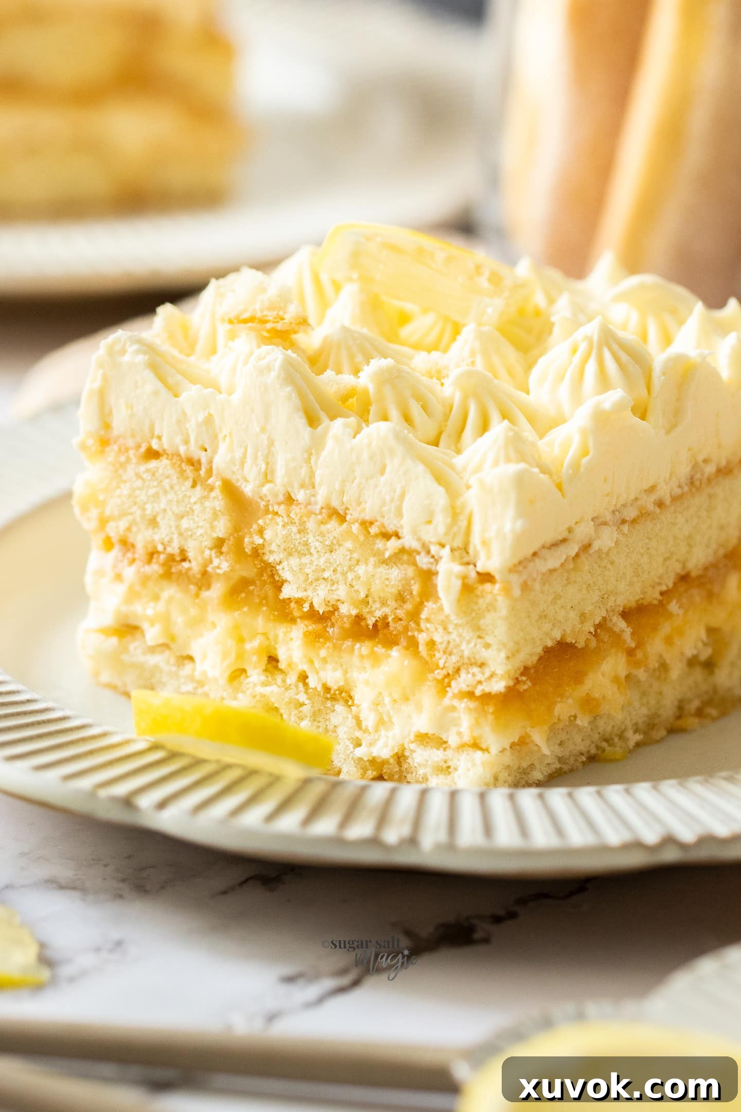 Closeup of lemon tiramisu on a dessert plate.