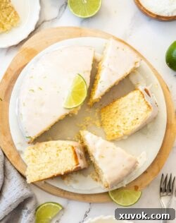 Top down view of a cake cut into slices on a cake plate.