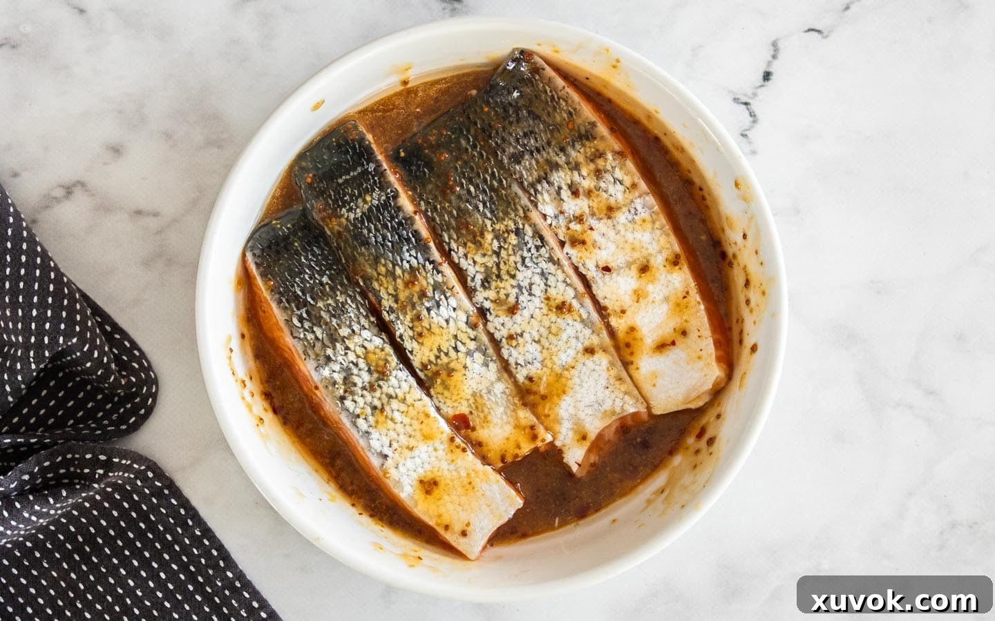 The salmon fillets in the honey mustard marinade.
