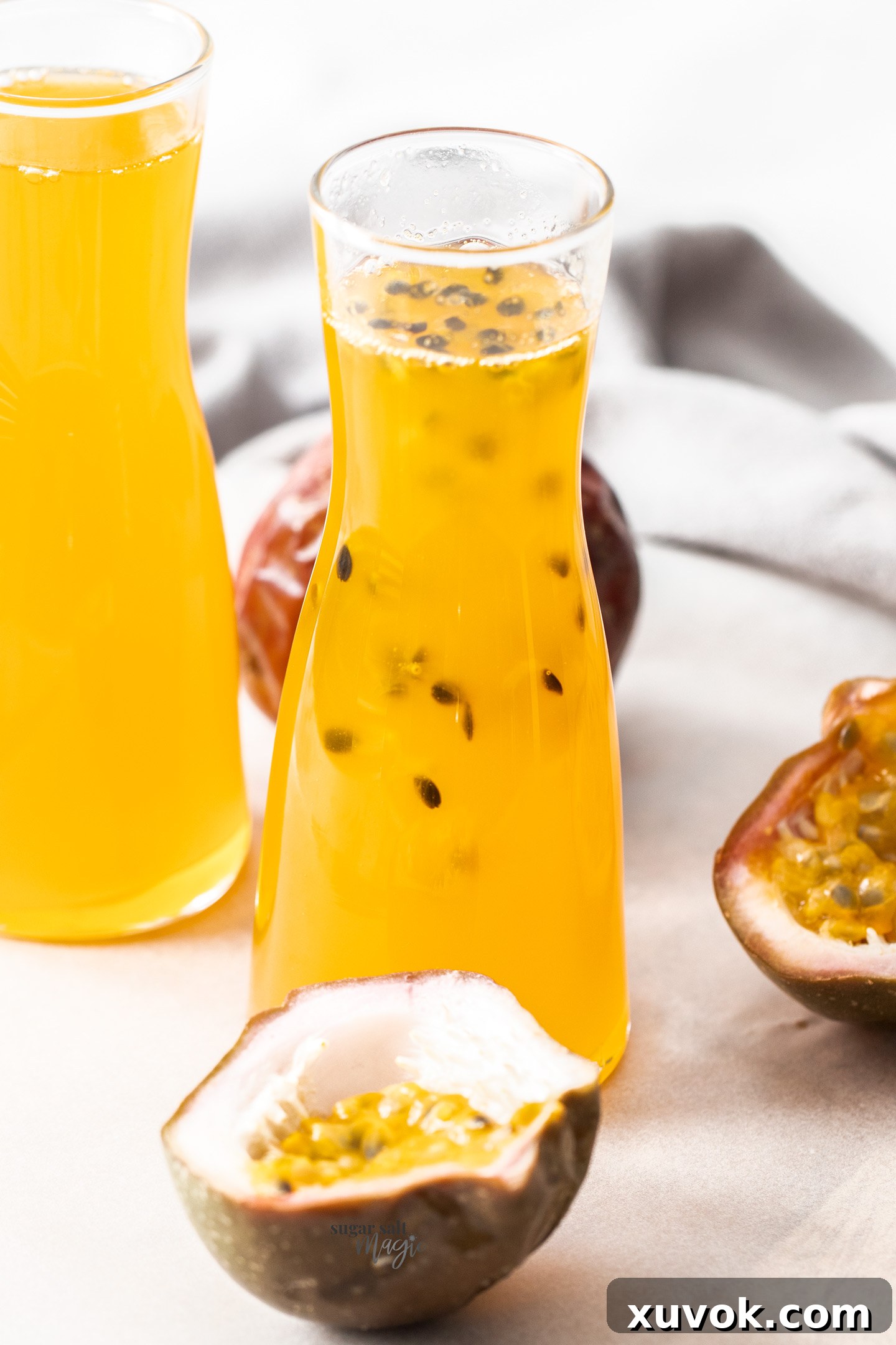 Closeup of a bottle of passionfruit syrup.