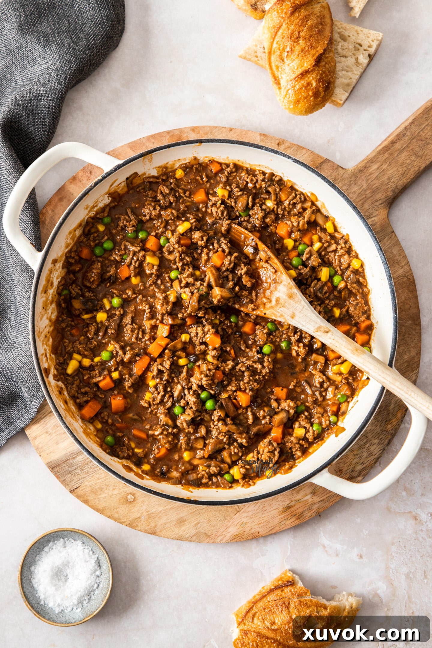 Top down view of a casserole pan filled with savoury mince, ready to serve.
