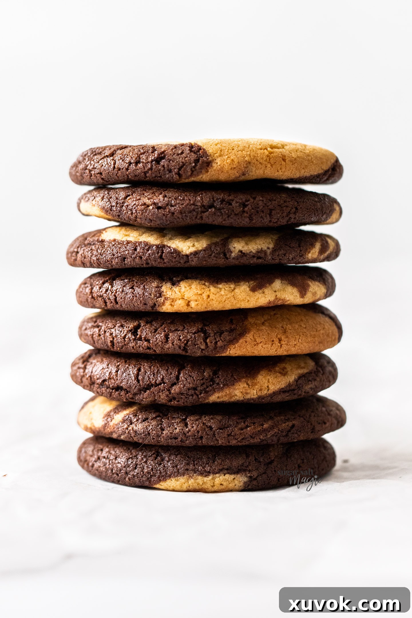 A stack of 8 marble cookies, showcasing their beautiful chocolate and vanilla swirl.