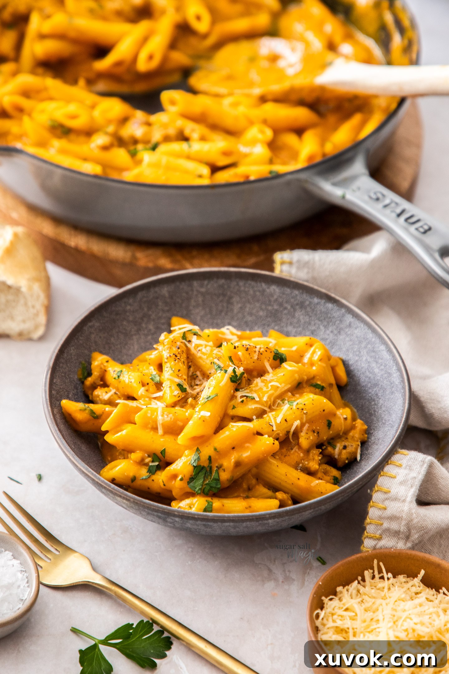 Pumpkin pasta in a small dinner bowl.