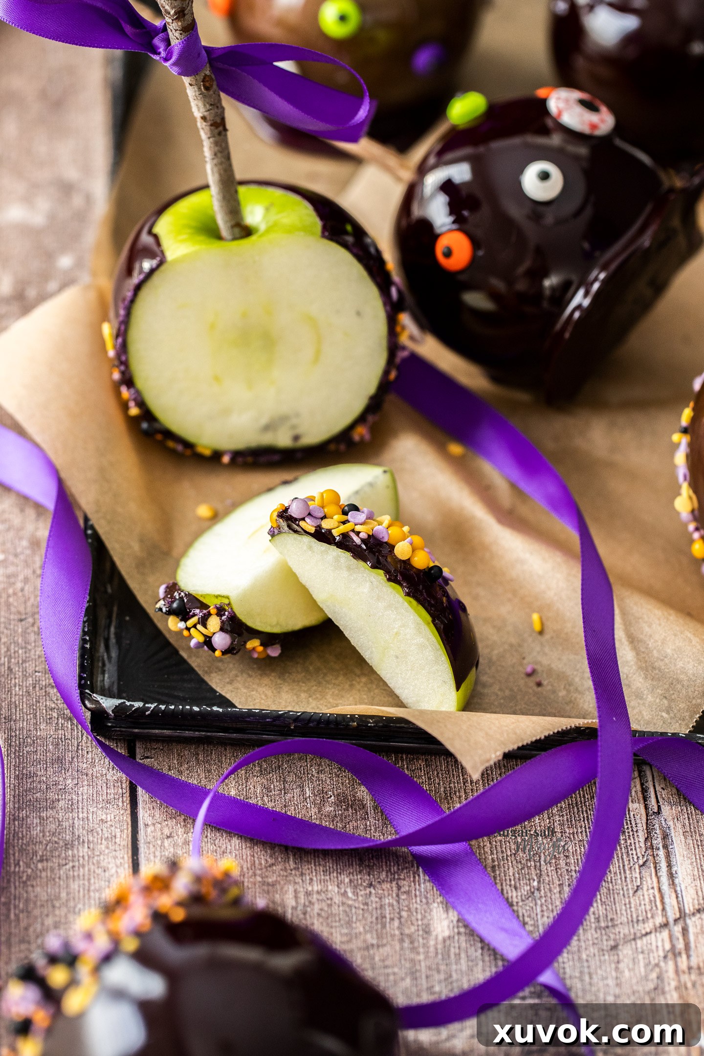 A candy apple cut into a few pieces.