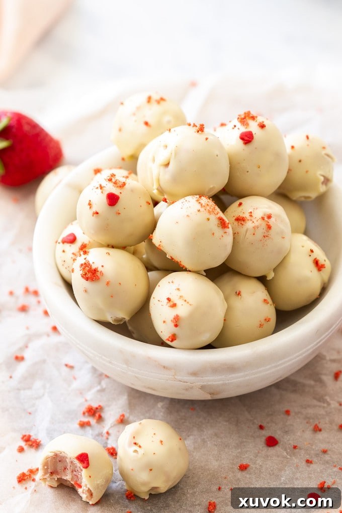 A batch of white chocolate truffles in a small white bowl