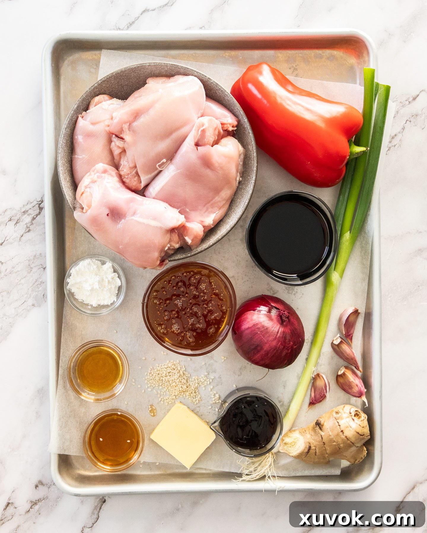 Ingredients for slow cooker honey soy chicken on a baking tray.