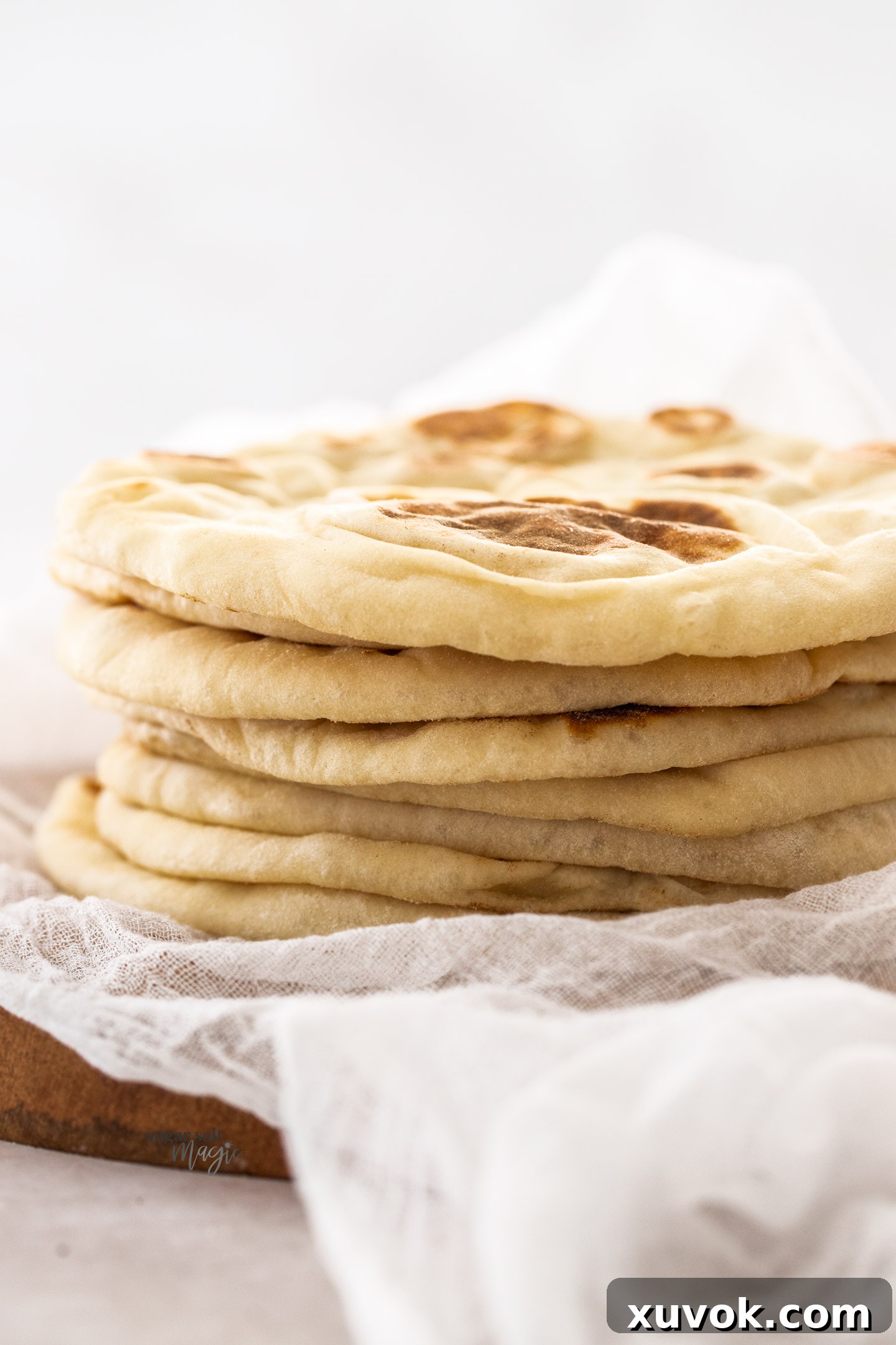 Side on view of a stack of flatbread showing their thickness.