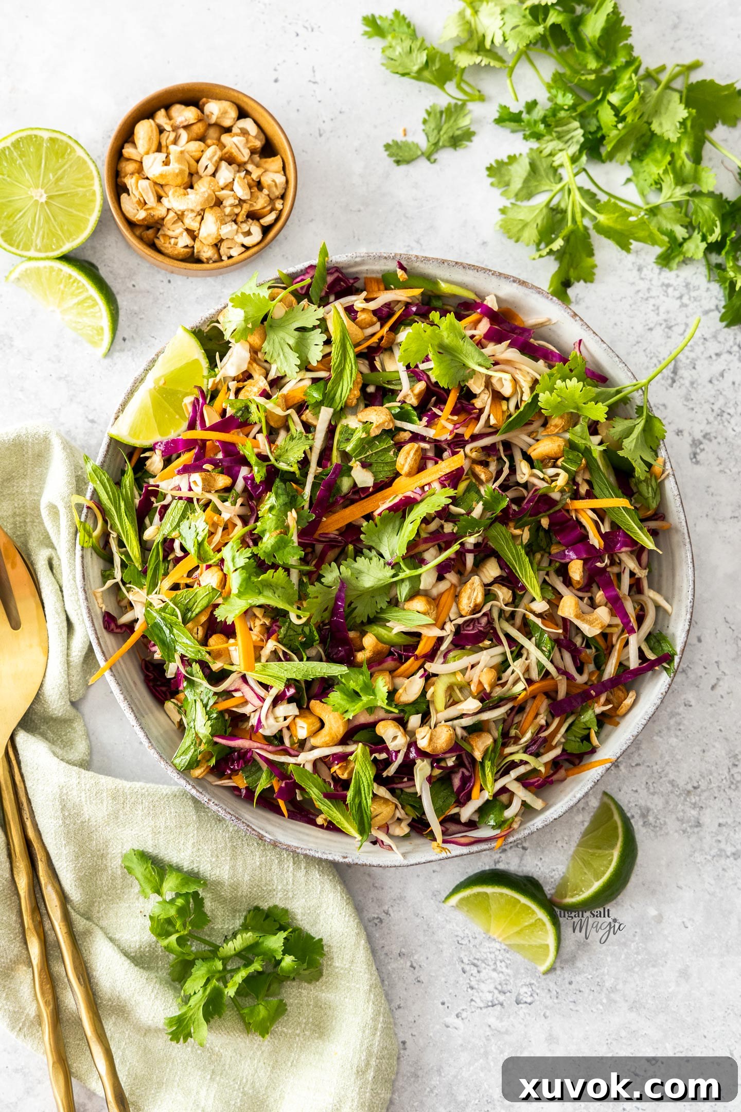 Top down view of vibrant asian salad in a bowl.