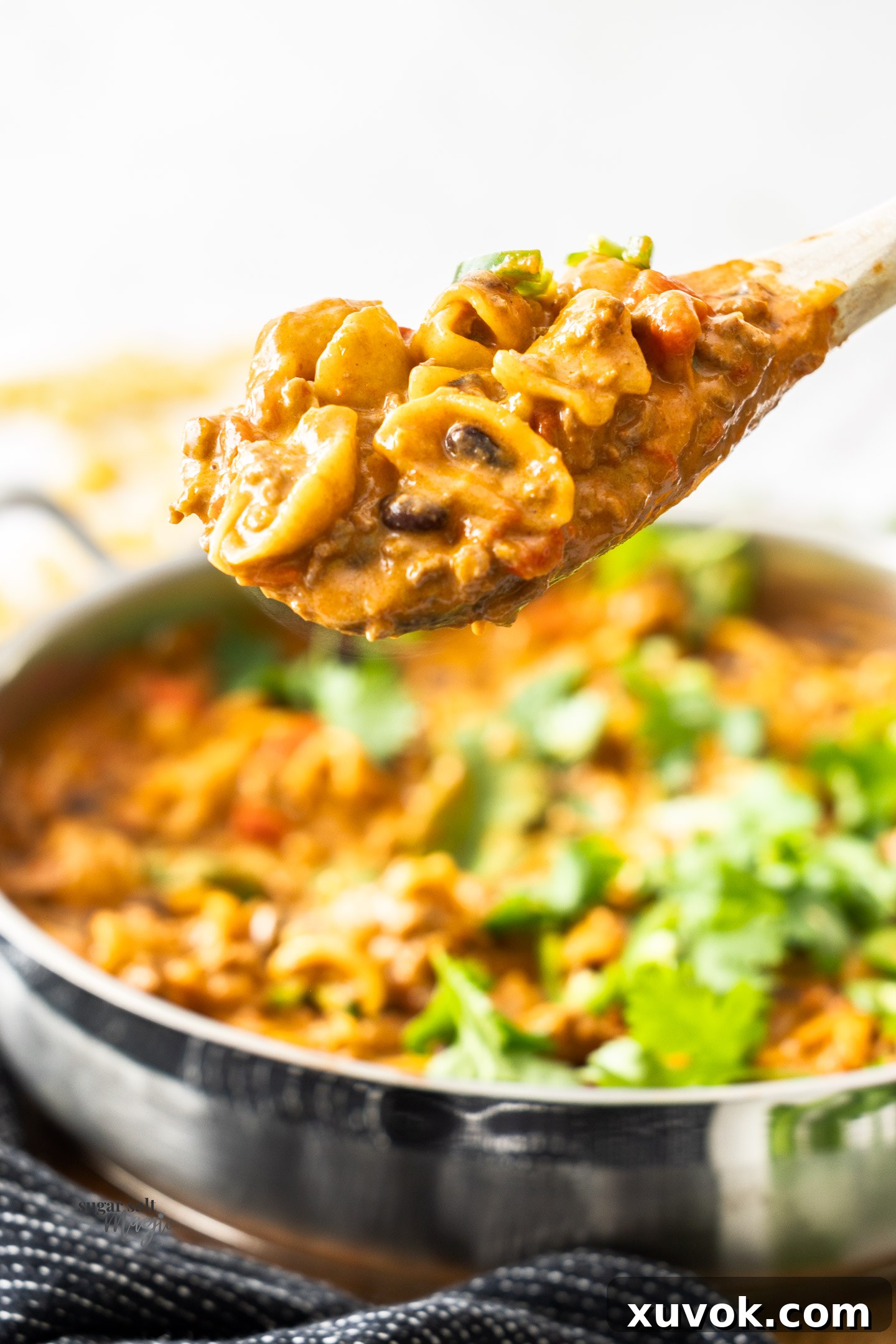 Taco pasta on a serving spoon.